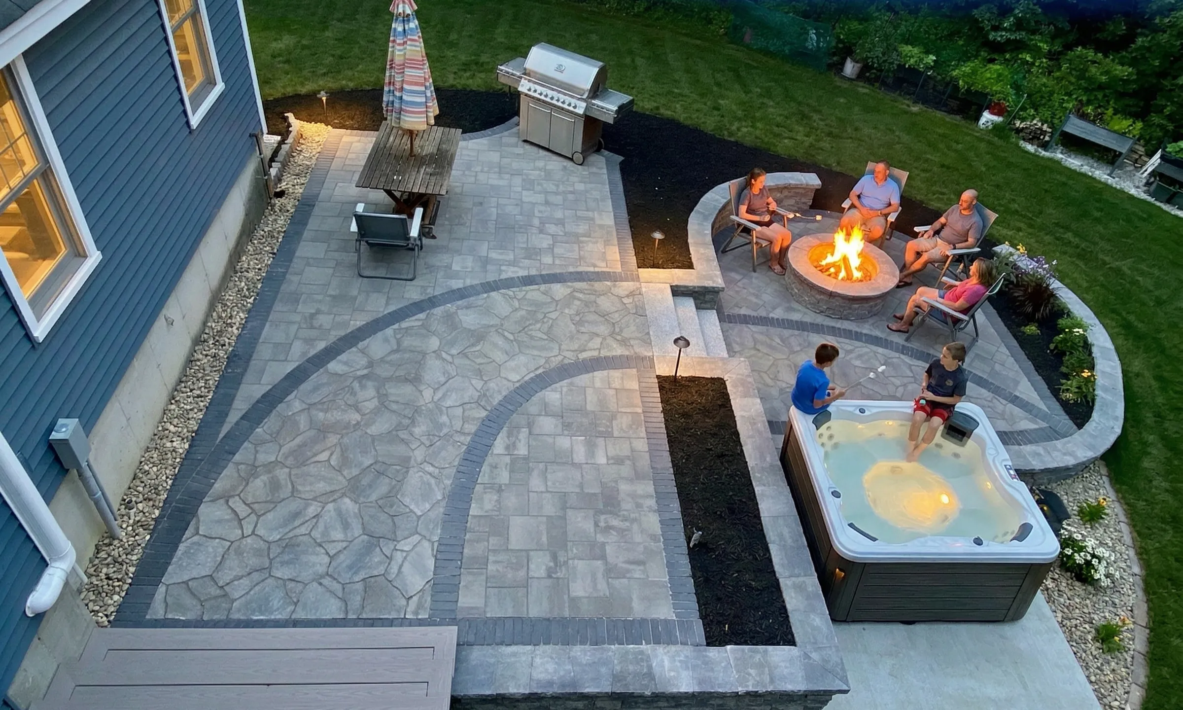 Mike DeLuca reviewing landscape plans on site